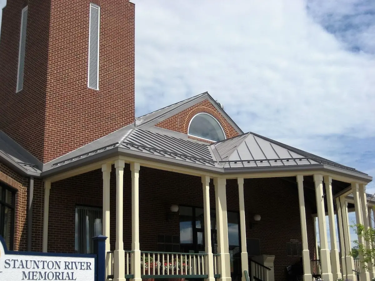 Skilled roofing craftsmen working on a residential roof in Victor Mills